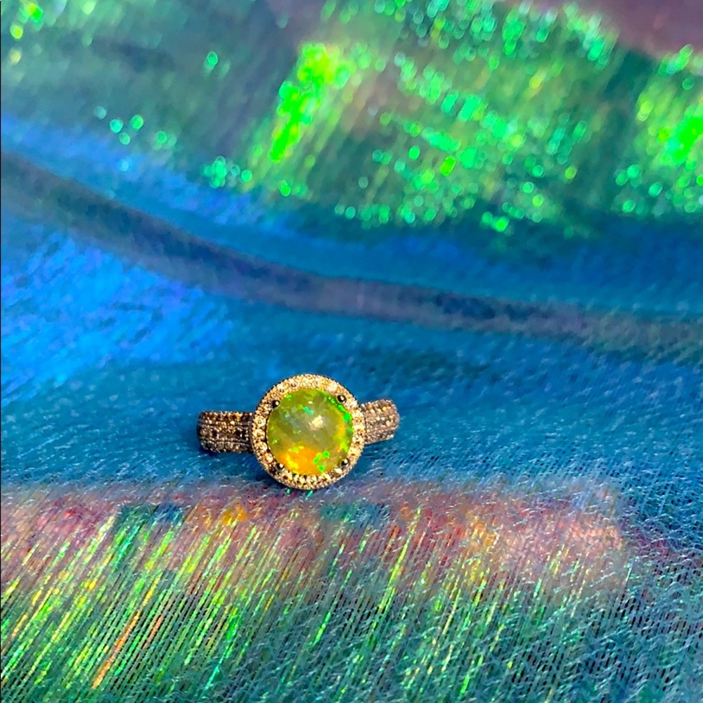 Cubic zirconia and created opal ring.